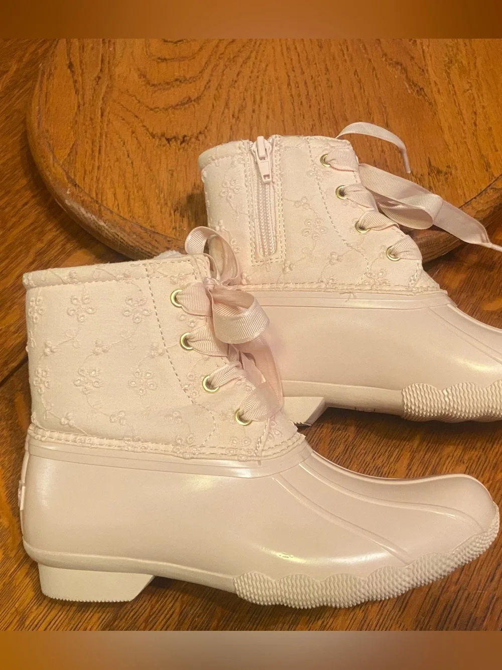 Sperry Girls powder pink lace-up all weather duck boots.